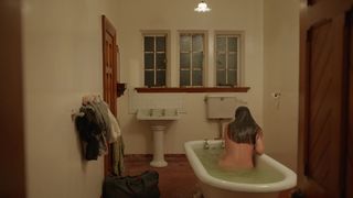 Arta Dobroshi - Stray (2018) bathroom nude scene