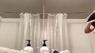 Peeping in the bathroom at a titty blonde