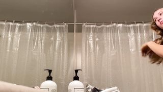 Peeping in the bathroom at a titty blonde