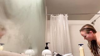 Peeping in the bathroom at a titty blonde