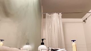 Peeping in the bathroom at a titty blonde