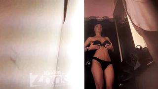 Hidden camera in the fitting room - Trying on the bra by a busty girl
