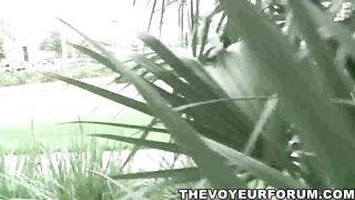 Petite teen flashing her tits outdoors