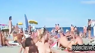 Horny voyeur is watching, while horny couples are having sex on the public nude beach