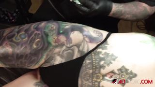 Busty babe Marie Bossette can hardly deal with the pain of getting a new tattoo