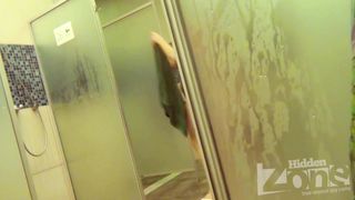 Hidden camera. Groping a woman wiping herself with a towel