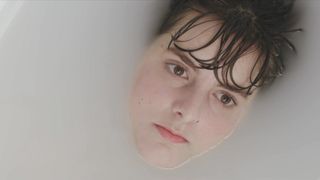 Pauline Romane - Amour (2021) nude bath scene