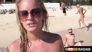 Super-Hot lesbos are bare and liking on the beach, while people are gazing at them