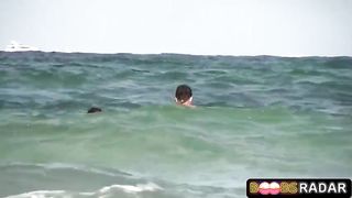 Slender gal with smallish jugs is nude on the beach and in the mood to be insane