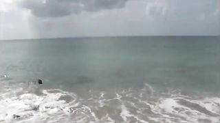 Lonely Chinese lady is showcasing her bare, moist bod, with enjoyment, while on the beach