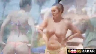 Superb looking honeys took off their tops on the beach, to get their baps suntanned