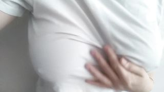 Cam-model is rubbing her breasts