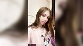 Nymphet shows her young tits on cam