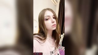 Nymphet shows her young tits on cam