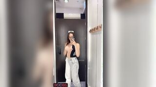 This appears to be her first topless tiktok in a store locker room