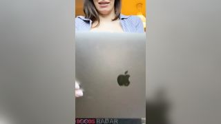 What's hiding the MacBook of this beauty girl. Are those big boobs? Let's see!