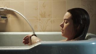 Camille Rowe not nude bath scene- The Deep House (2021)