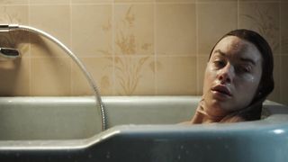 Camille Rowe not nude bath scene- The Deep House (2021)