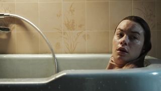 Camille Rowe not nude bath scene- The Deep House (2021)