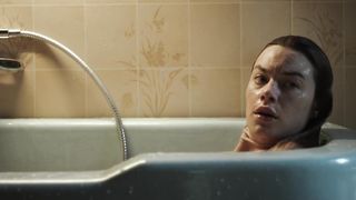 Camille Rowe not nude bath scene- The Deep House (2021)