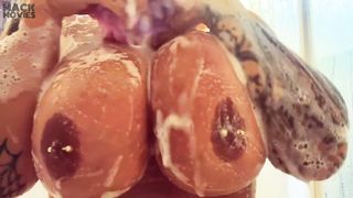 Black wet boobs in white foam. Busty video in bathroom