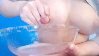 Stroking my knockers in the glass cup. A bunch of milk.