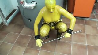 Binding and dominating solo girl. Naked in latex in the industrial zone