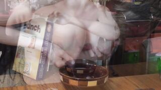 A sexy hottie made herself a breakfast of milk. By the way, the milk is from her own boobs.