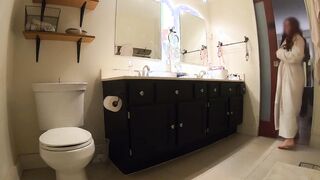 Bathroom peeing. My sandy-haired stepmom caught bare in robe