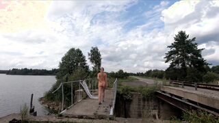Nude woman on the bridge