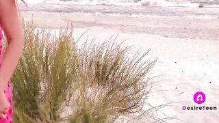 Hump on the beach with people around