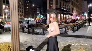 Switching into sheer sundress on a active downtown night