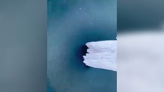 Jug juggle on the trampoline