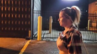 Dame ambles down street bare-breasted