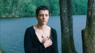 Camille Berthomier nude- Astrakan (2022) topless short scene