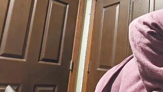 Grandma's topless sorting out her laundry