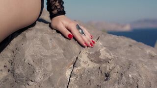 Rocks, sea and Nudity Beauty Lady