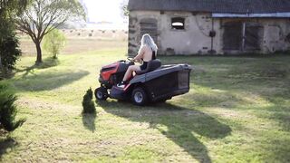 Chubby Busty Girl. Topless Woman Riding On Aa Tractor