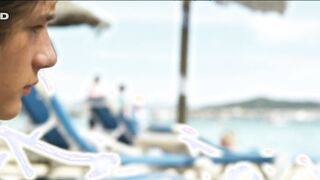 Carolina Clemente nude. Implosion (2011) Public topless scene on the beach